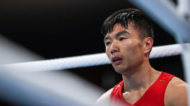 开云官网-视网膜两次脱落 胡建关靠毅力站在东奥拳击赛场